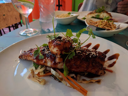 Miller's Thumb glazed grilled fish on slaw with cilantro garnish