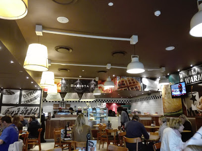 Mugg & Bean Longbeach Mall interior with diners and counter