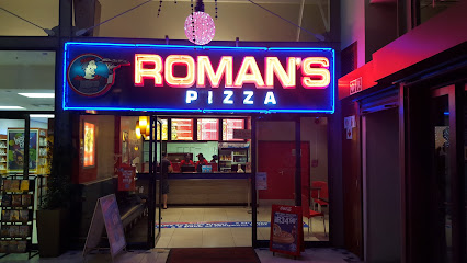 Roman's Pizza Milnerton storefront with neon sign and counter