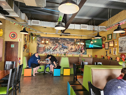 Fat Cactus Tygervalley dining area with colorful booths and mural
