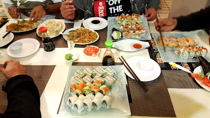 Group dining at Roseberry: assorted sushi and Chinese dishes on table