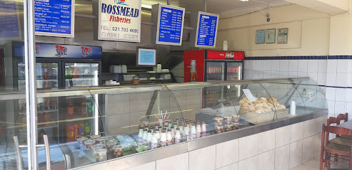 Rossmead Fisheries counter with glass display case, menu boards and takeaway items
