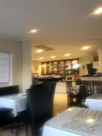 Jason Sushi & Chinese Restaurant dining area with bar counter