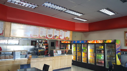 Aneesa's Athlone counter with menu boards, service area and drink fridges