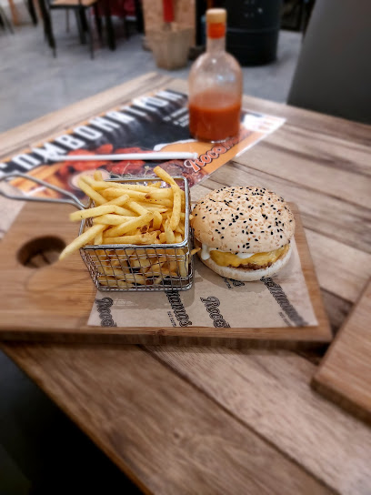 RocoMamas Kenilworth Centre Halaal burger and fries on wooden board