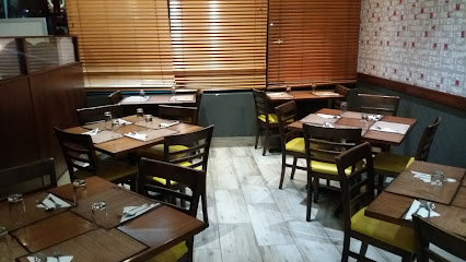 Simply Asia Kenilworth dining room with set tables and chairs