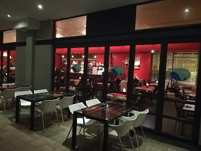Asian-Asia restaurant patio and indoor dining with red interior