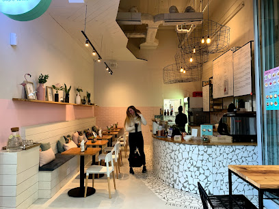 The Poke Co Sea Point interior with mosaic service counter and seating
