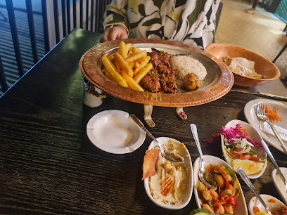 Istanbul Kebab CT mixed-grill platter with rice, fries and meze