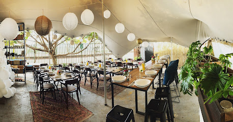 Folk Cafe St. James interior — cozy tented dining with set tables