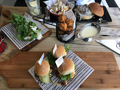 Hudsons Green Point trio of mini burgers on a wooden board