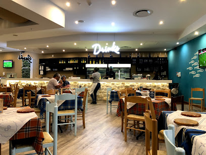 Ocean Basket Kenilworth Centre dining area with bar and tables
