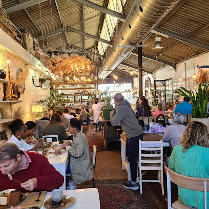 Pajamas & Jam Eatery interior with busy morning diners