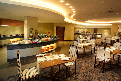 Riempie's Restaurant dining room with buffet island and set tables
