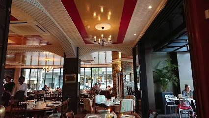VIXI Social House interior with diners, tables and bar seating
