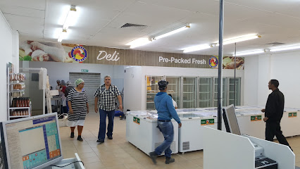Kekkel en Kraai Town Centre deli area with customers and chest freezers