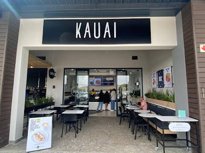 KAUAI Clara Anna Fontein storefront with outdoor tables and customers