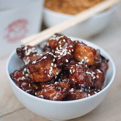 Monk's Chinese Newlands sesame-glazed fried bites in white bowl