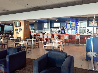 Alba Easy Lounge interior showing bar, high stools and dining tables