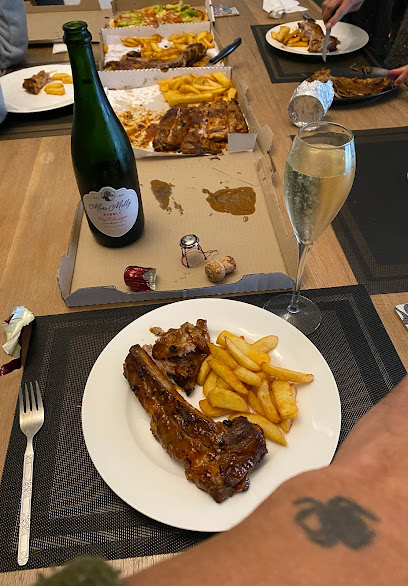 Magic Pizza Flamingo Square table with open pizza boxes, fries and ribs