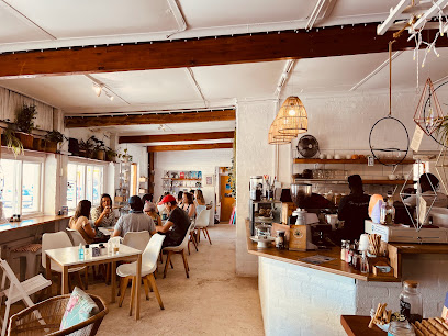 Blended Health Cafe & Catering interior with patrons and barista at counter