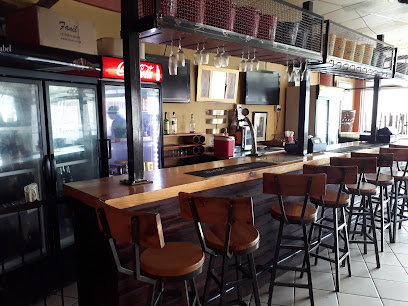 Schwarma & Pizza Cafe wooden service counter with bar stools