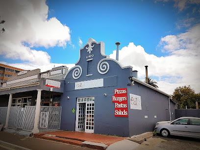 Eat Out The Box Wynberg takeaway storefront with 'Pizzas Burgers Pastas Salads' sign