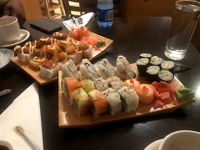 Kobe Sushi Newlands sushi platters with assorted rolls on wooden boards