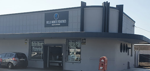 Bello Monte Fisheries storefront with sign, entrance and red postbox