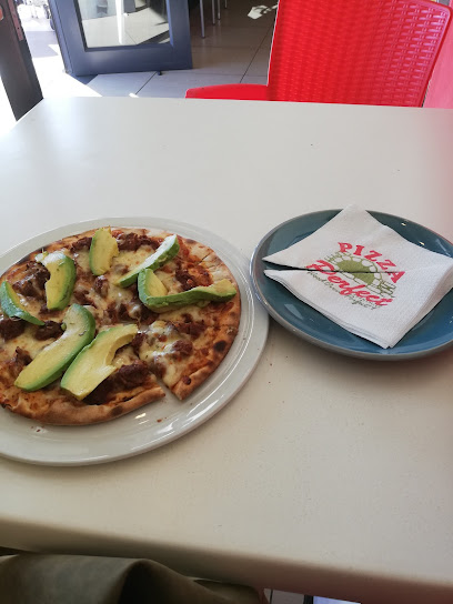 Pizza Perfect Somerset West avocado-topped pizza with branded napkin