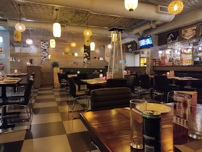 Taishan Kitchen Kloof Street interior with hanging lanterns, booths and dining tables