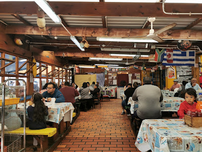 Kalky's bustling dining room with customers at shared tables