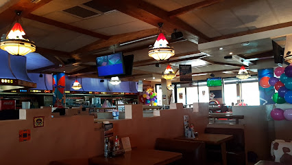 San Miguel Spur Plumstead interior with booths, hanging lamps and TVs