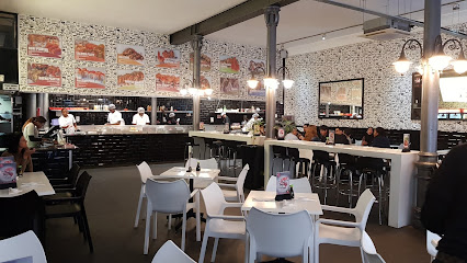Nuri Sushi CBD Cape Town interior with chefs behind sushi counter