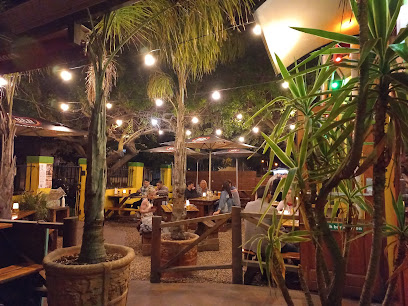 Banana Jam Cafe outdoor patio with string lights and diners