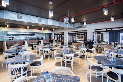 Cape Town Fish Market V&A dining area with set tables and chairs