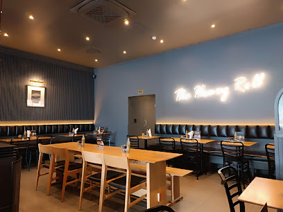 Bootlegger Rosmead Avenue Halaal cafe interior with banquette seating and wooden tables