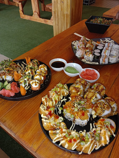 Assorted sushi platters on wooden table at J&S Sushi Mitchells Plain