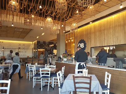 Ocean Basket Table Bay Mall dining area with staff and customers