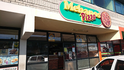 Mehano's Pizza storefront with green sign and pizza logo