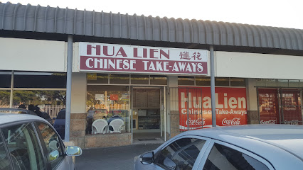 Hua Lien Chinese Take-Aways storefront with red signage and parked cars