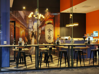 Minato Sushi interior with counter seating, tall stools and lantern mural