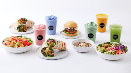 KAUAI Virgin Active Sanctuary spread of bowls, wraps and colorful smoothies