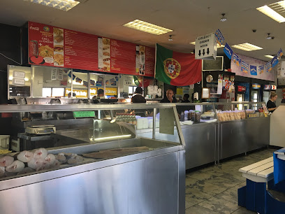 Durbanville Fisheries stainless-steel service counter with staff and menu boards