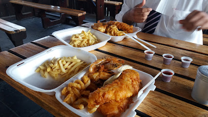Fish on the Rocks takeaway battered fish and chips in foam containers