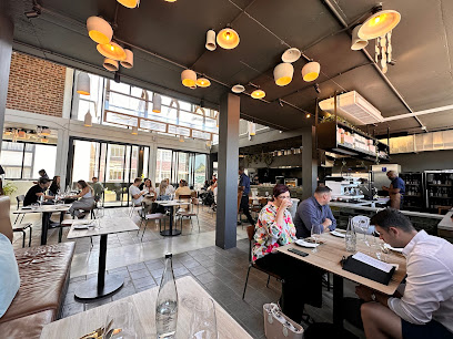 Galjoen restaurant interior in Cape Town with seated diners and open kitchen
