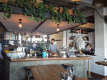 SALT Kalk Bay interior showing counter with staff preparing orders