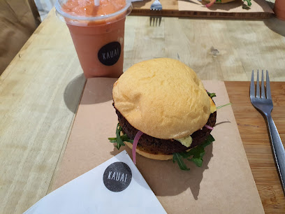 KAUA burger with greens and a pink smoothie at Kauai Blue Route Mall