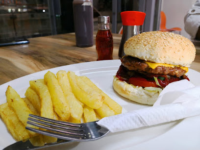 Mariam's Kitchen Kromboom cheeseburger with sesame bun and thick fries