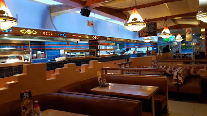 Seven Spur interior with booth seating, pendant lamps and open food counter